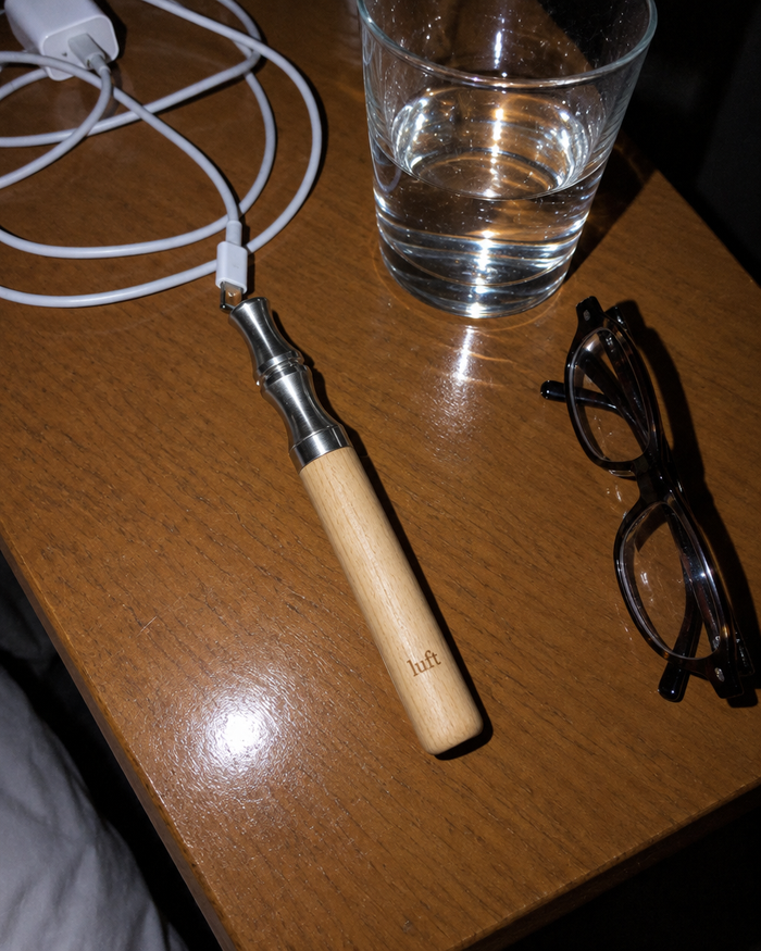 Maple Luft on a bedside table at night
